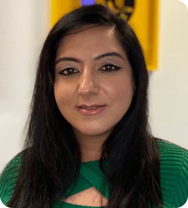 a woman with long hair and a green shirt