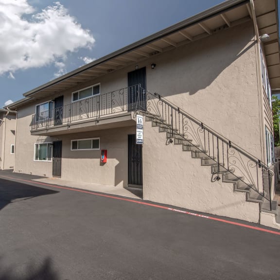 Buena Vista Apartment building with a staircase to the second floor