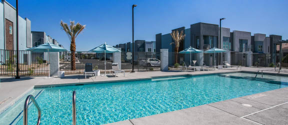 a rendering of a hotel pool with palm trees in the background