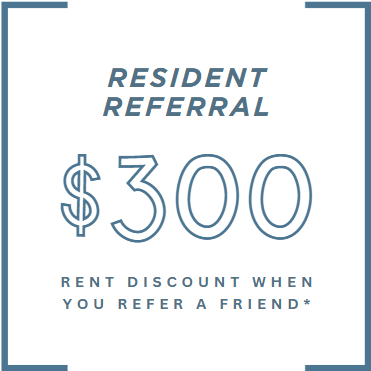 A sign advertising a $300 referral reward.