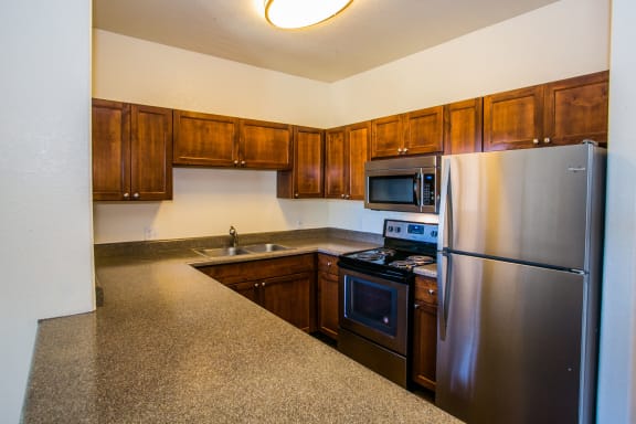 Spacious Kitchen with Quality Appliances at RidgeGate Apartments 85027