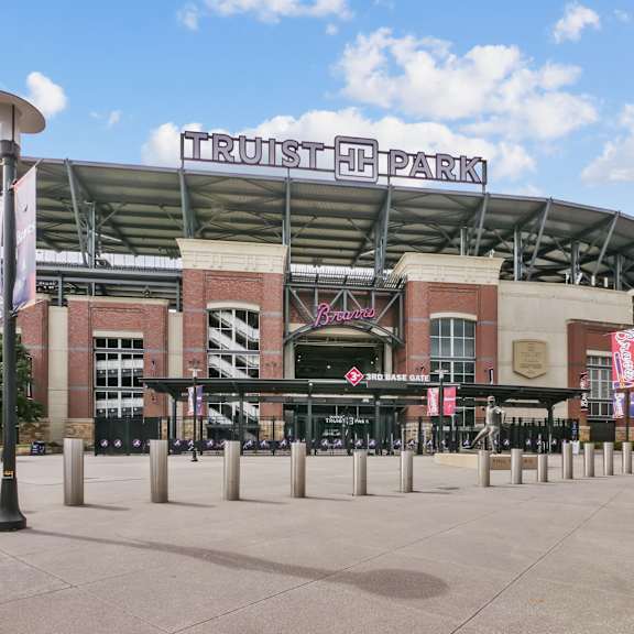 A stadium with a sign that says "Trust Park".