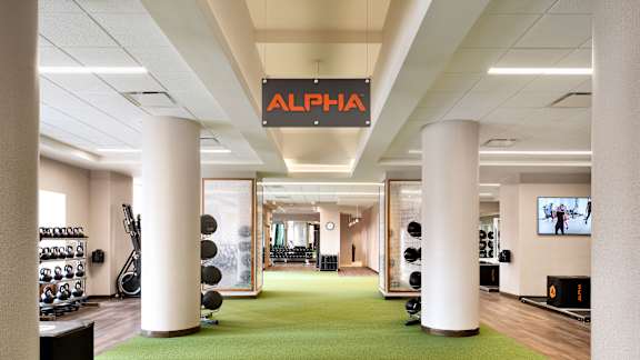 A gym with a green floor at One West, New York, New York
