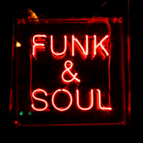 a neon sign that says funk and soul