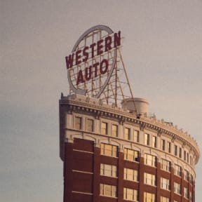 Large Building with Western Auto Sign