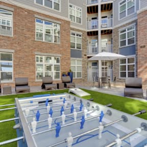 The Edison at Wheat Ridge Apartments in Wheat Ridge, Colorado Courtyard with Foosball Table