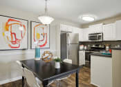 Thumbnail 1 of 13 - our spacious kitchen and dining area at the district flats apartments in lenexa
