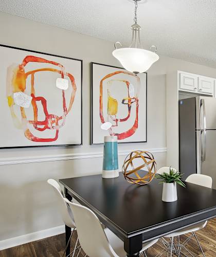 our spacious kitchen and dining area at the district flats apartments in lenexa