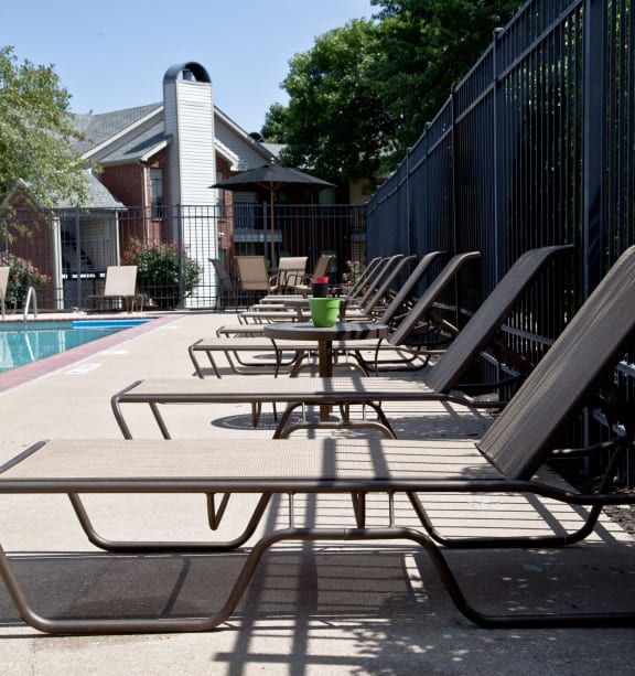 Poolside Relaxing Chairs at Vanderbilt Apartments, St Peters, MO