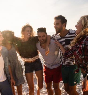 A group of friends are enjoying a day at the beach.