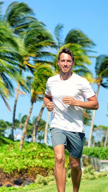 Lifestyle photo of man running at Marbrisa Apartments, Miami Gardens