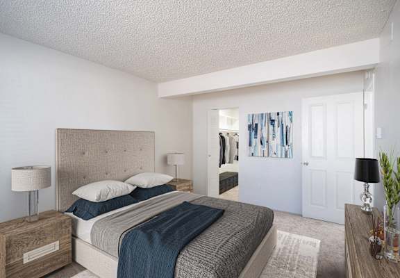 a bedroom with a bed and a closet