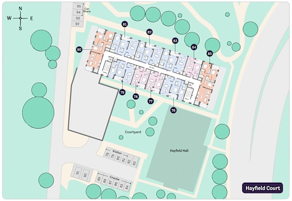 A map shows a grid of buildings with a visitor center and a courtyard.