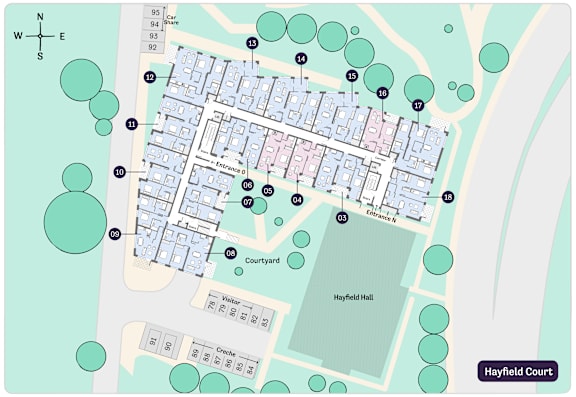 A map shows a grid of buildings with a visitor center, courtyard, and hayfield hall.