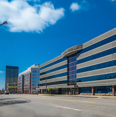an office building on the corner of a city street