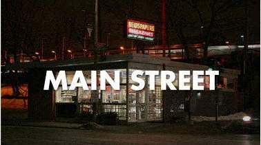A street lamp with a sign that says Main St.