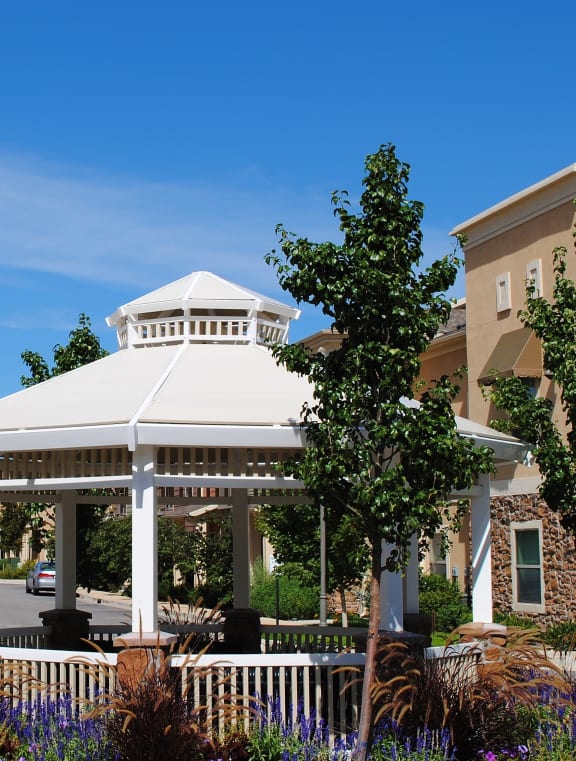 a gazebo in front of a building
