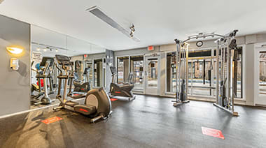 an image of the gym at the residences at omni louisville apartments