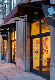 The front of a building with a sign that says Circle Studio.