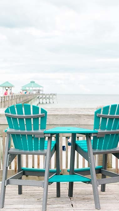 Lifestyle photo of beach lounge chairs