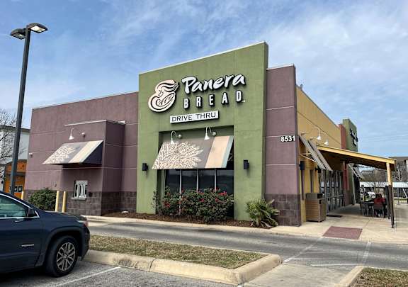 A Panera Bread storefront with the sign "Drive Thru" and the number 8531.