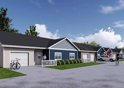 A modern house with a garage and a driveway.