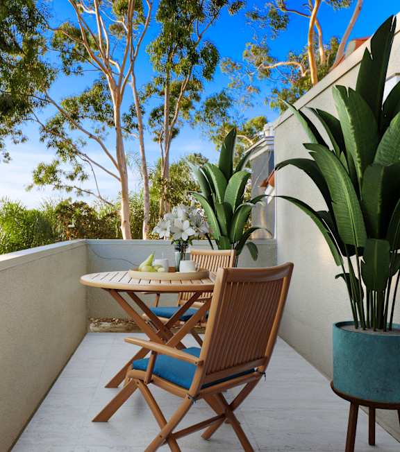 a balcony with table and chairs at Playa Summit, Los Angeles