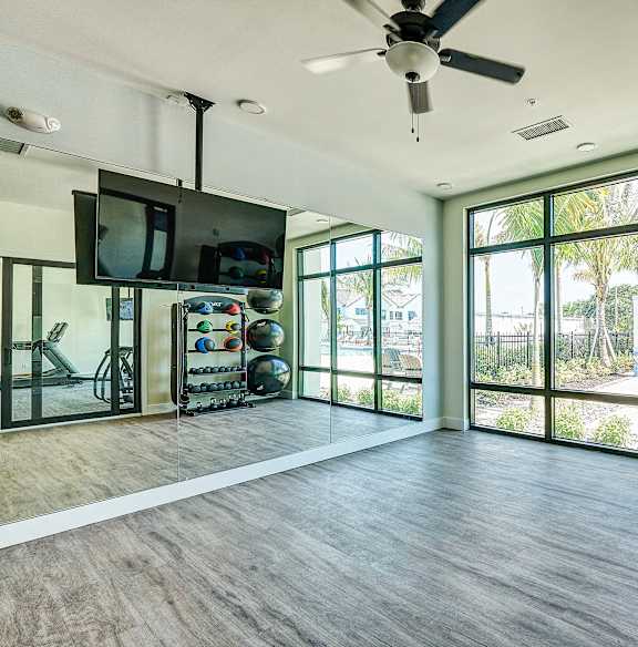 a rendering of an apartment complex with a pool and parking lot  at Imperial Crossing Luxury Apartment Homes, Bonita Springs, FL, 34134
