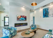 Thumbnail 31 of 49 - a living room with couches and a coffee table at Imperial Crossing Luxury Apartment Homes, Bonita Springs, FL, 34134