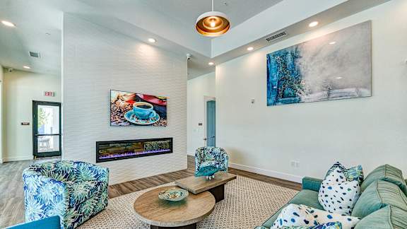 a living room with couches and a coffee table at Imperial Crossing Luxury Apartment Homes, Bonita Springs, FL, 34134