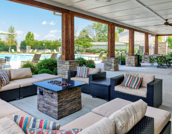 Glenbrook Apartments - Outdoor covered lounge with fire pit