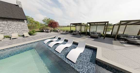 A modern pool with a waterfall feature in the middle.