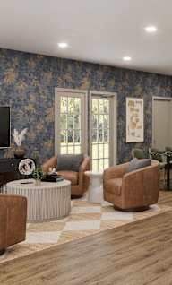 A modern living room with a television, sofas, and a kitchen area.