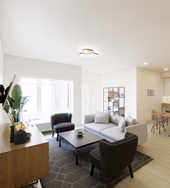 A modern living room with a black and white color scheme.