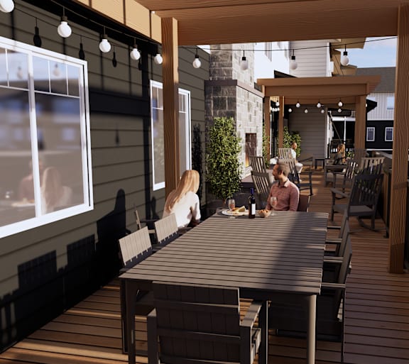 A patio with a table and chairs is shown with a blurred background.