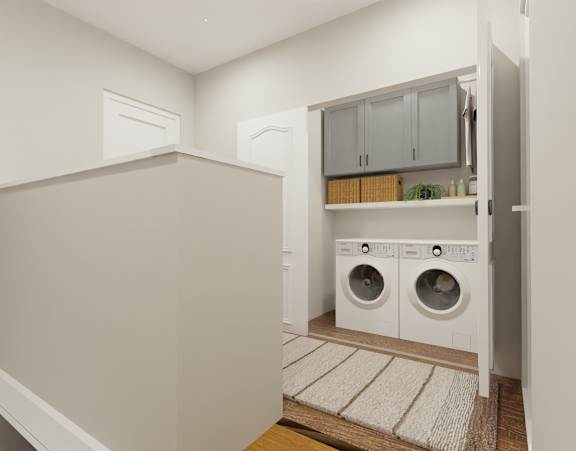 A laundry room with a washer and dryer.