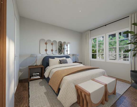 a bedroom with a bed and two stools