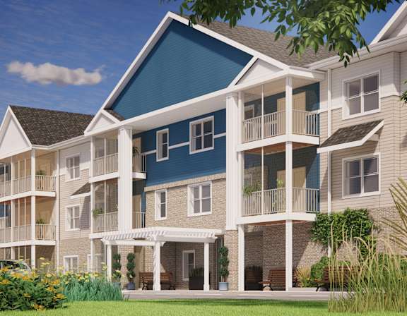 A blue and white two story apartment building with a balcony on the second floor.