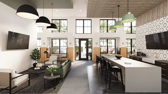 A modern kitchen and living room with a long table and chairs.