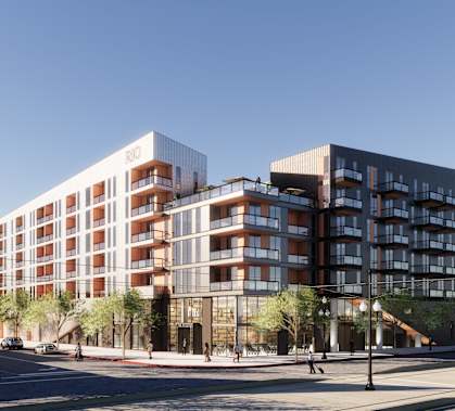 a rendering of an apartment building on a city street