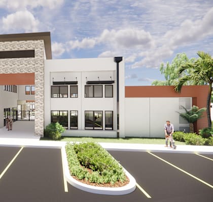 a rendering of a two story building with a street in front of it