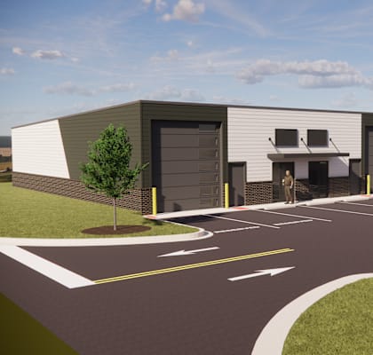 A rendering of a modern building complex with a parking lot in front.