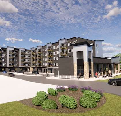 a rendering of a large apartment building with cars parked outside