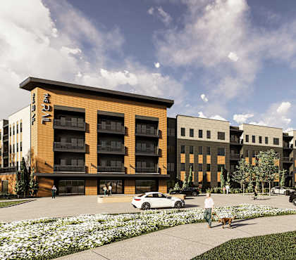 a rendering of a new apartment building on a city street at The Rail, St. Louis