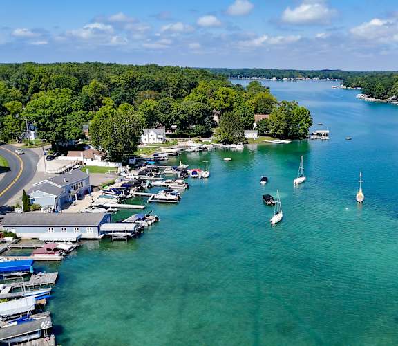 arial view of boats in the water on a lake