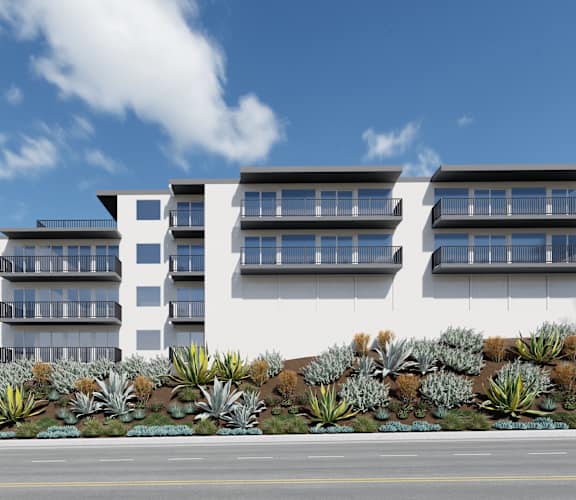 an architectural rendering of a large white building with solar panels on the side of it at Ocean Edge @ Laguna Beach Apartments, California