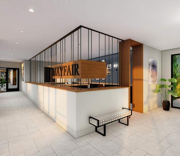 a rendering of a lobby with a reception desk and a glass door at 2929 on Mayfair, Wauwatosa, WI