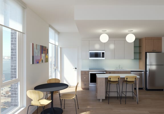 kitchen and dining room with a table and chairs at Allied Harbor Point, Baltimore