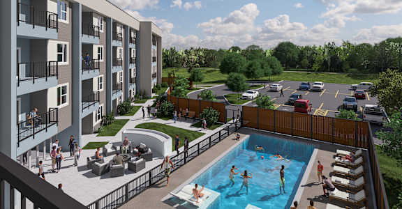 A group of people are gathered around a swimming pool.