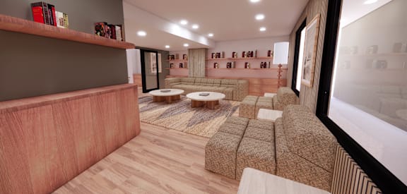 A living room with a couch, ottoman, and bookshelf.